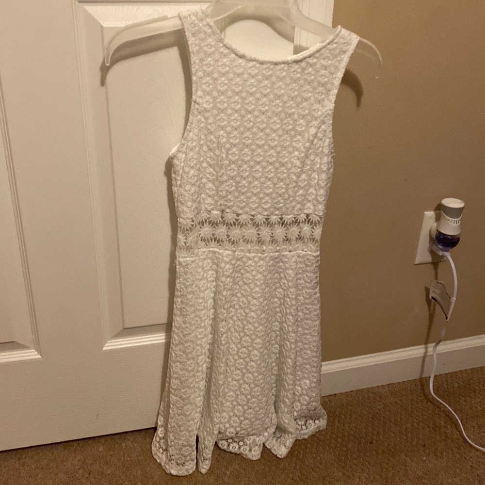 White casual dress, worn once, above knee.